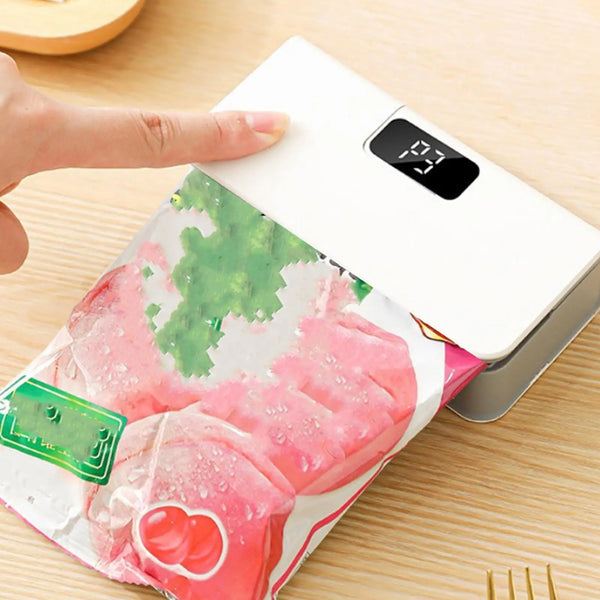Small-Bag-Sealer-2-In-1-Chip-Bag-Sealer-And-Cutter-Vacuum-Sealer-Fridge-Magnet-6.jpg